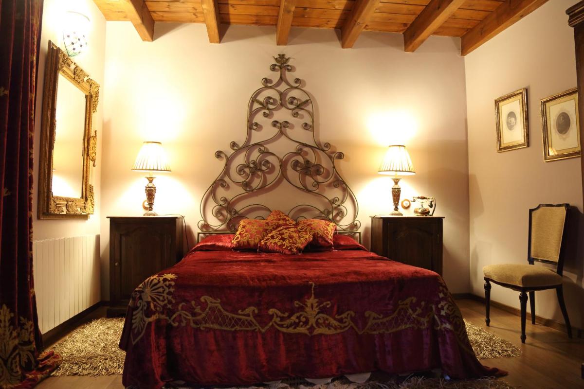 Cama o camas de una habitación en La Posada Del Canal