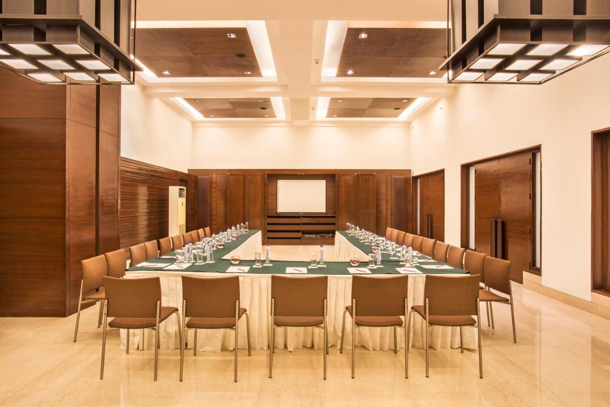 a large conference room with a long table and chairs at Trident Agra in Agra
