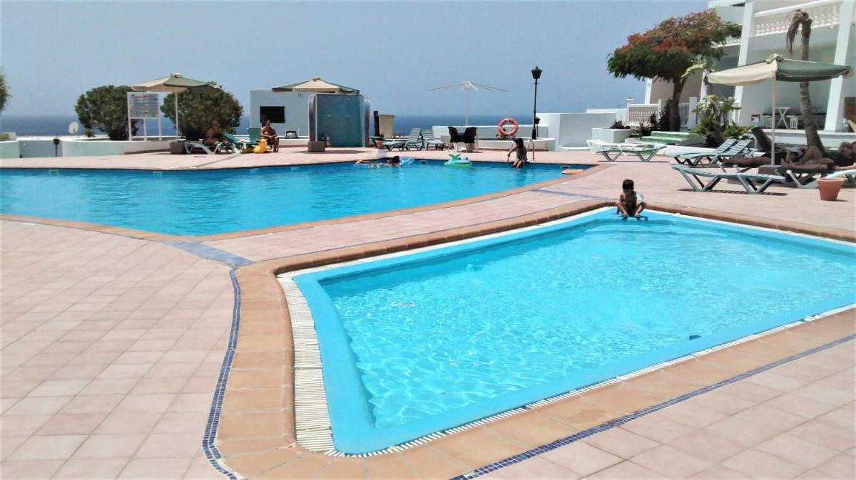 Apartamento Renovado,vistas piscina, aire acondicionado,wifi - Housity