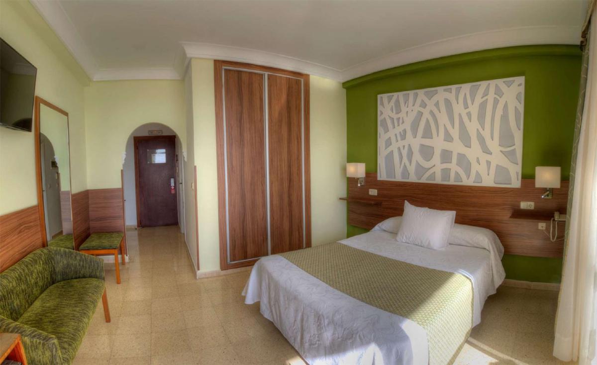 Cama o camas de una habitación en Hotel & Spa Entremares