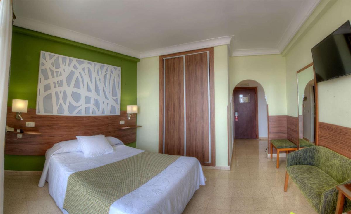 Cama o camas de una habitación en Hotel & Spa Entremares