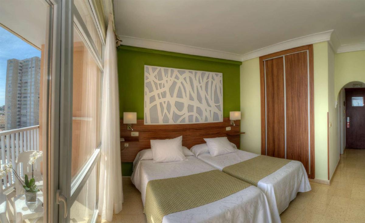 Cama o camas de una habitación en Hotel & Spa Entremares