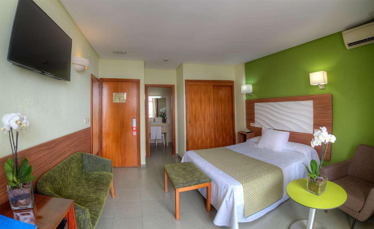Cama o camas de una habitación en Hotel & Spa Entremares