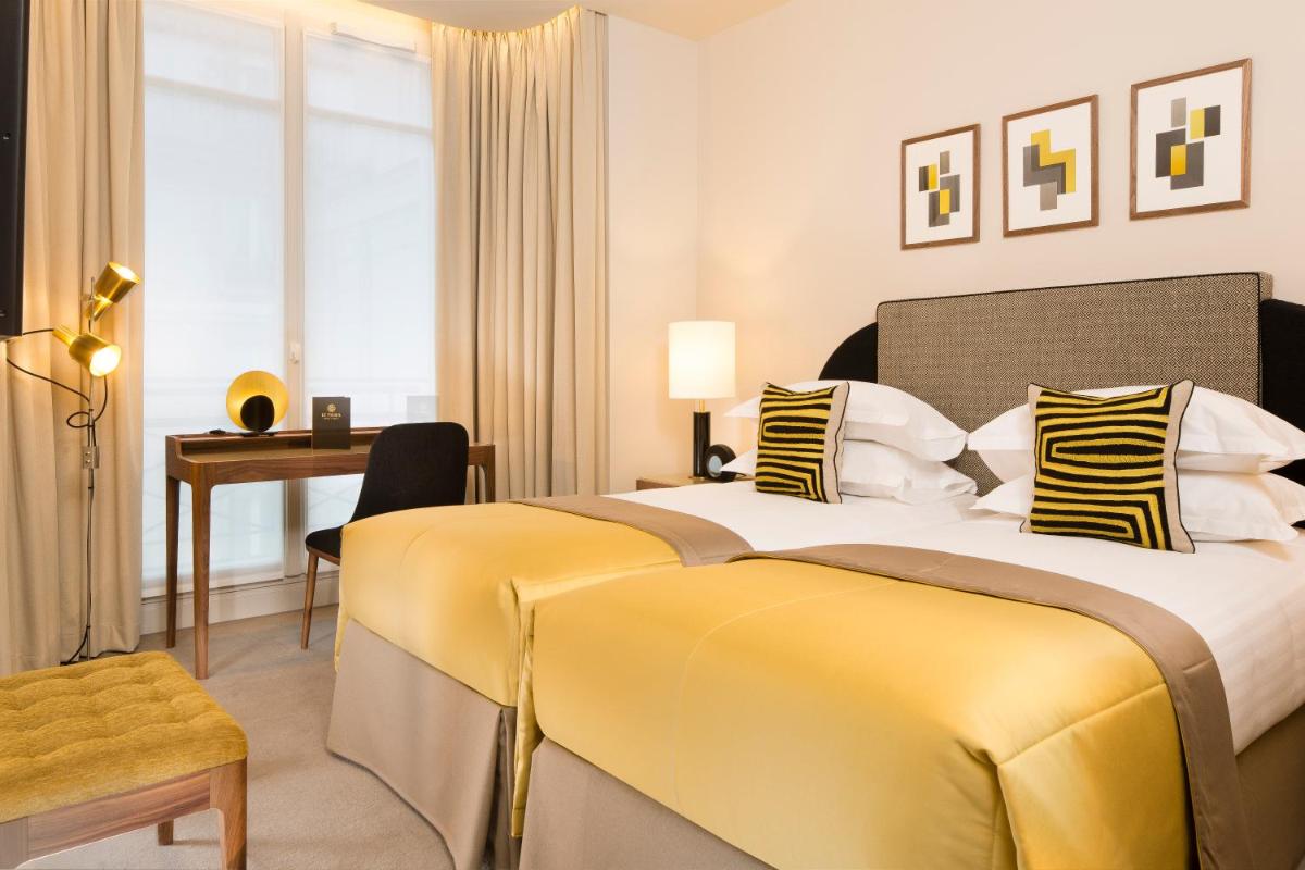 Un ou plusieurs lits dans un hébergement de l'établissement Le Tsuba Hotel