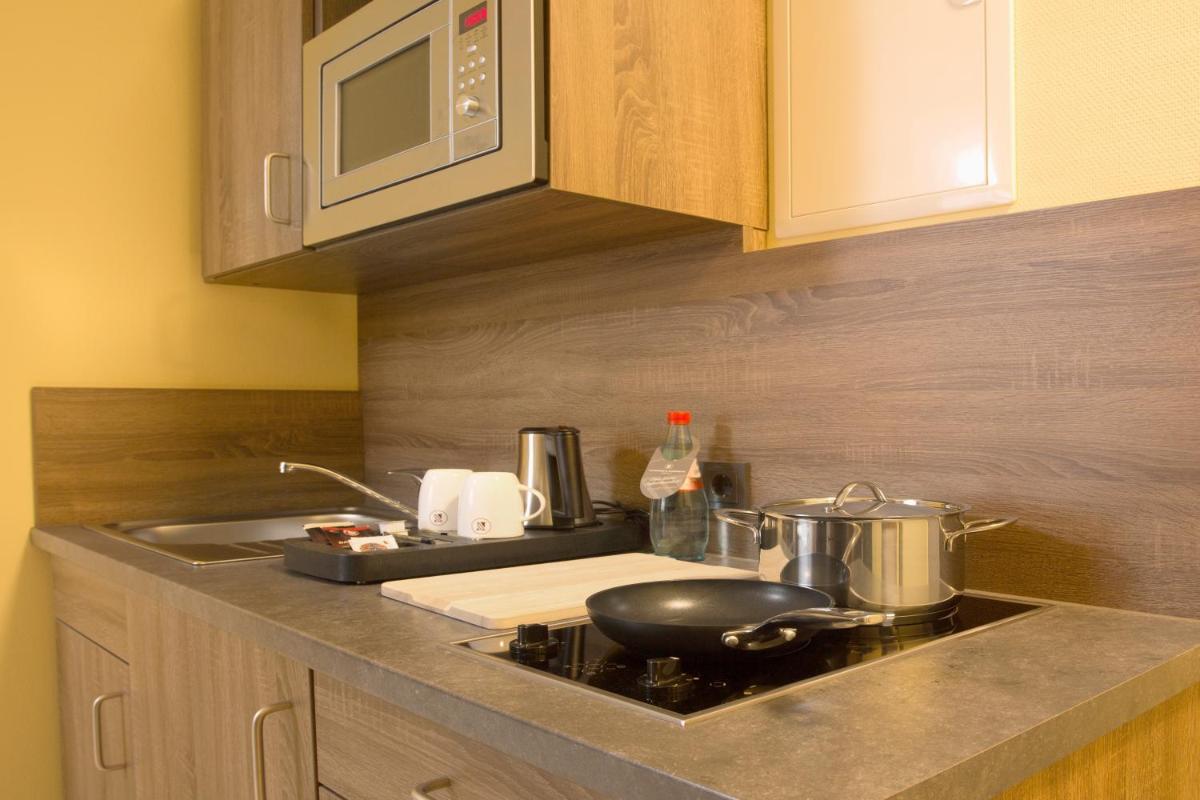 Naam Apartment Frankfurt Hotel City-Airport - Housity