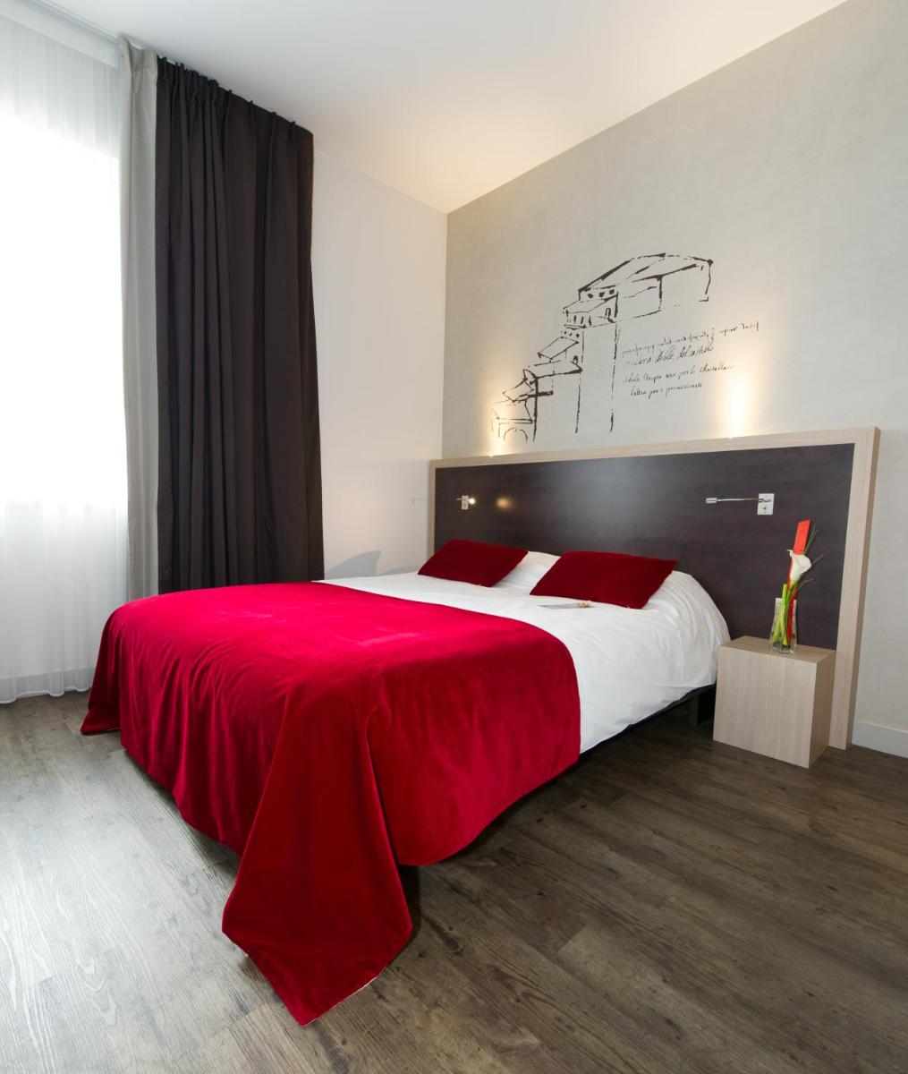 Un ou plusieurs lits dans un hébergement de l'établissement Best Western Plus Villa Saint Antoine Hotel & Spa