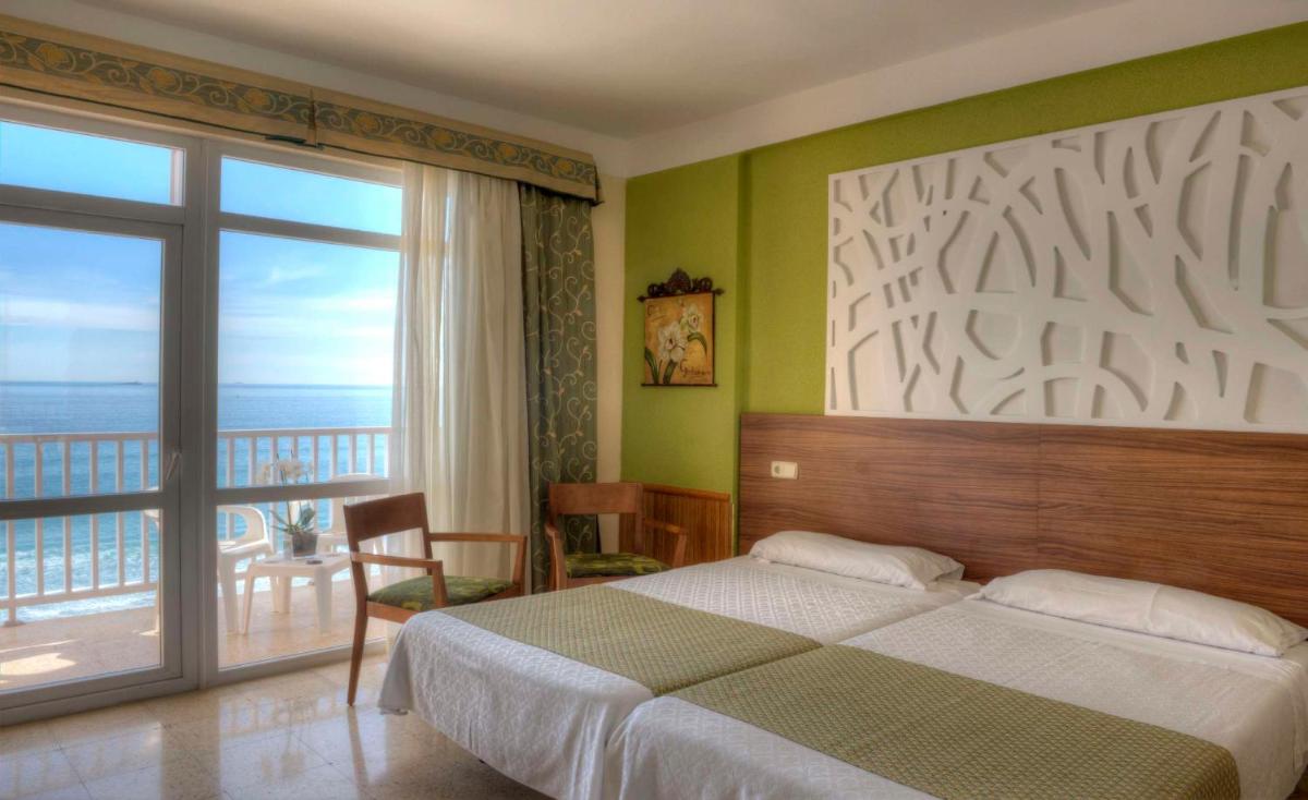 Cama o camas de una habitación en Hotel & Spa Entremares
