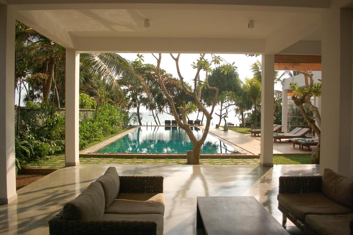 Roman Beach Hotel - Housity