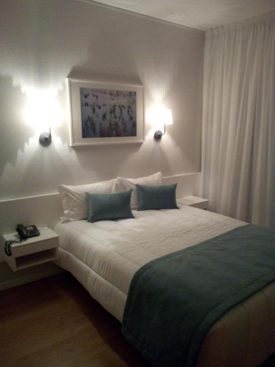 Uma cama ou camas num quarto em Hotel Costa de Prata 2 & Spa