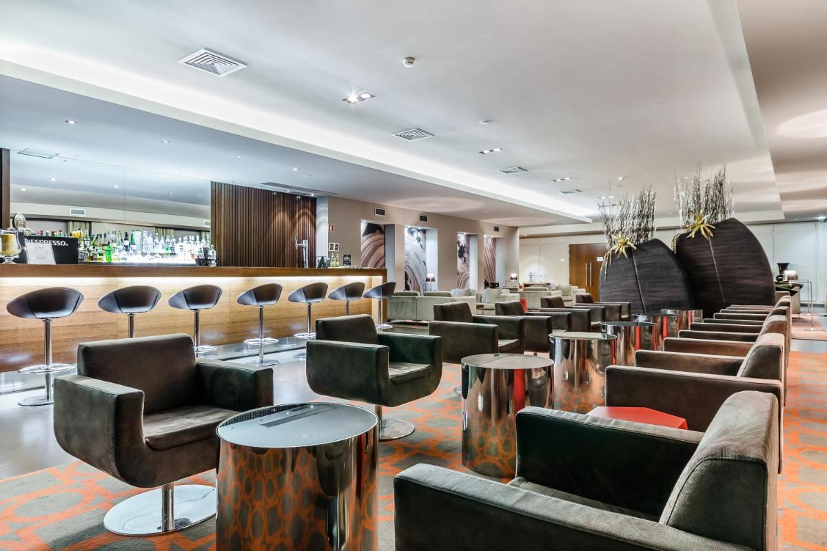 Uma área de estar em Hotel Villa Batalha