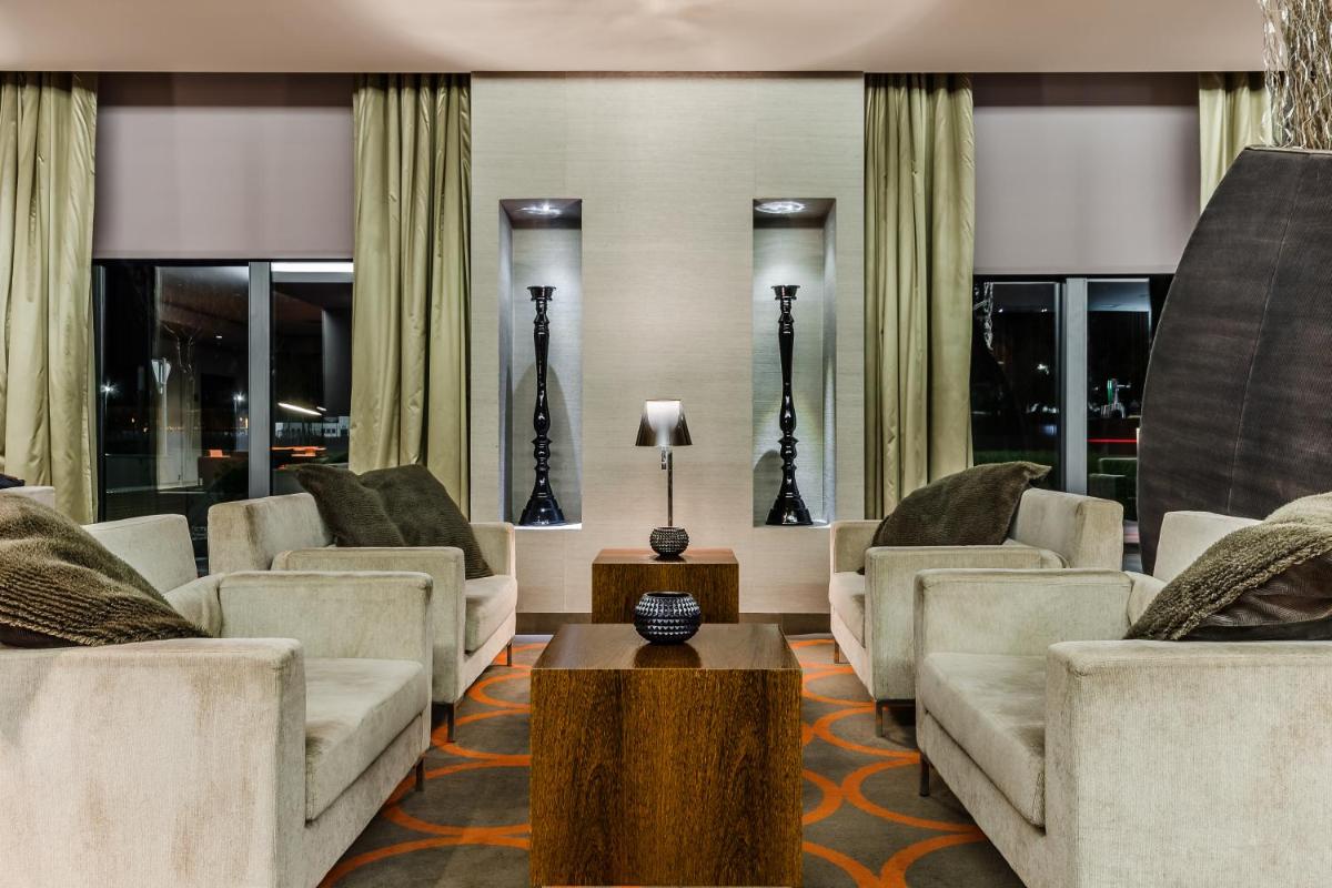 Uma área de estar em Hotel Villa Batalha