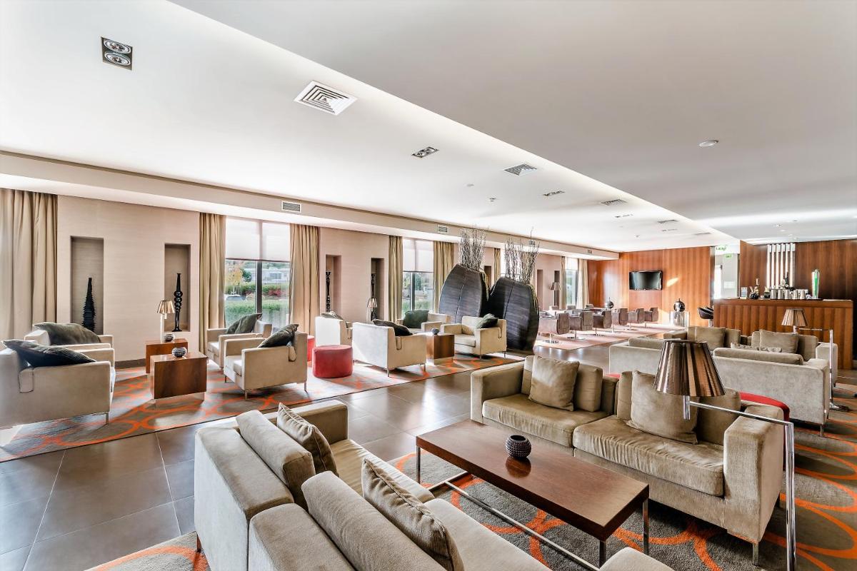 Uma área de estar em Hotel Villa Batalha
