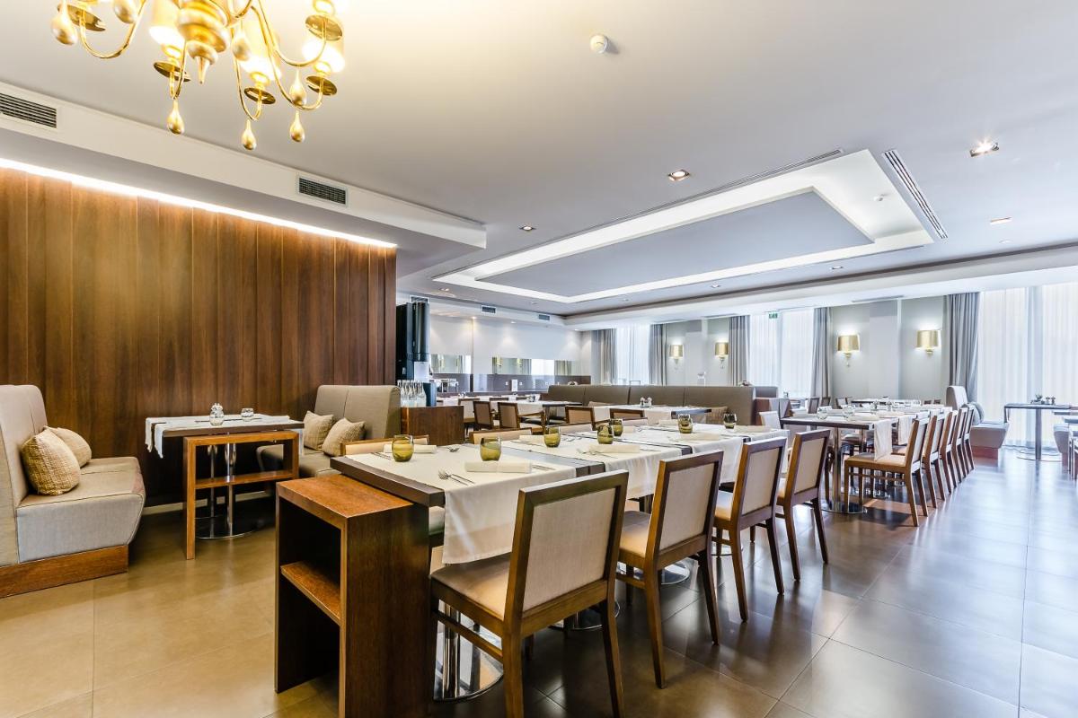 Uma área de estar em Hotel Villa Batalha
