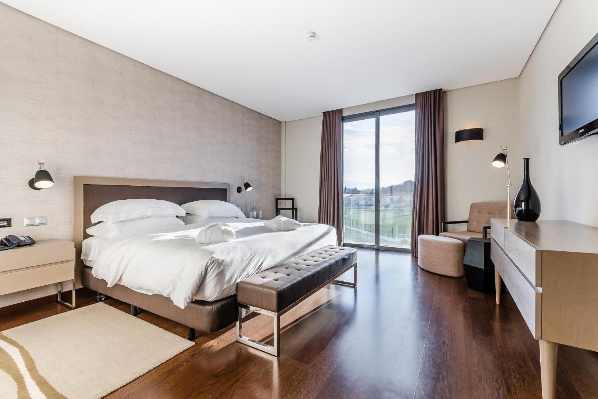 Uma cama ou camas num quarto em Hotel Villa Batalha