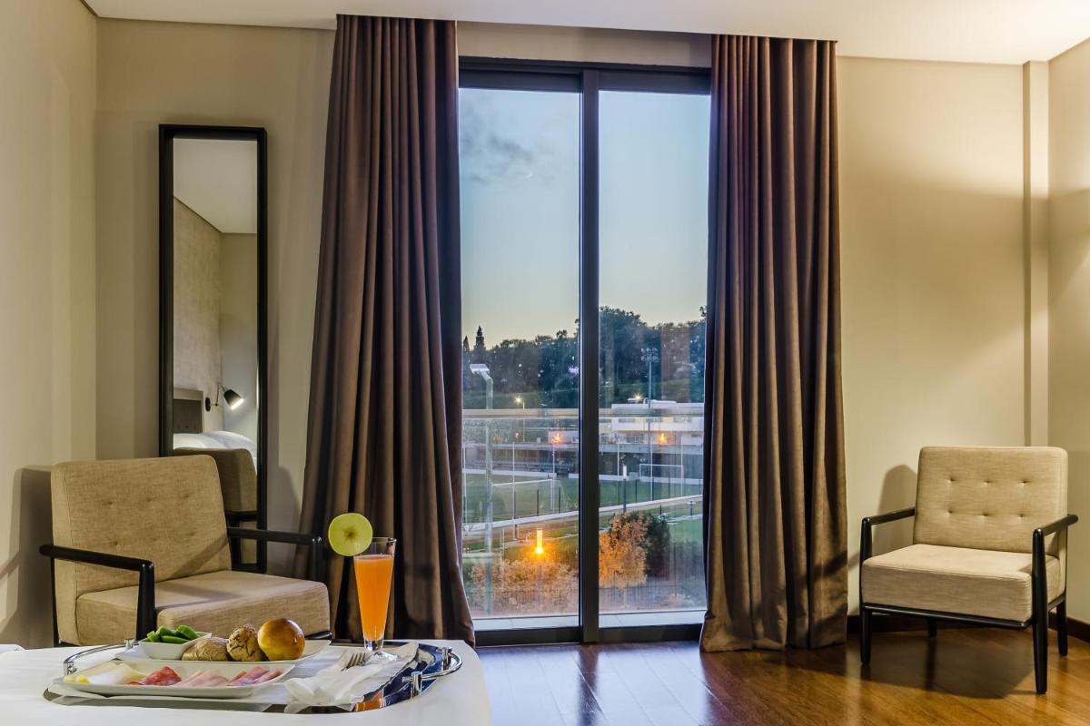 Uma área de estar em Hotel Villa Batalha
