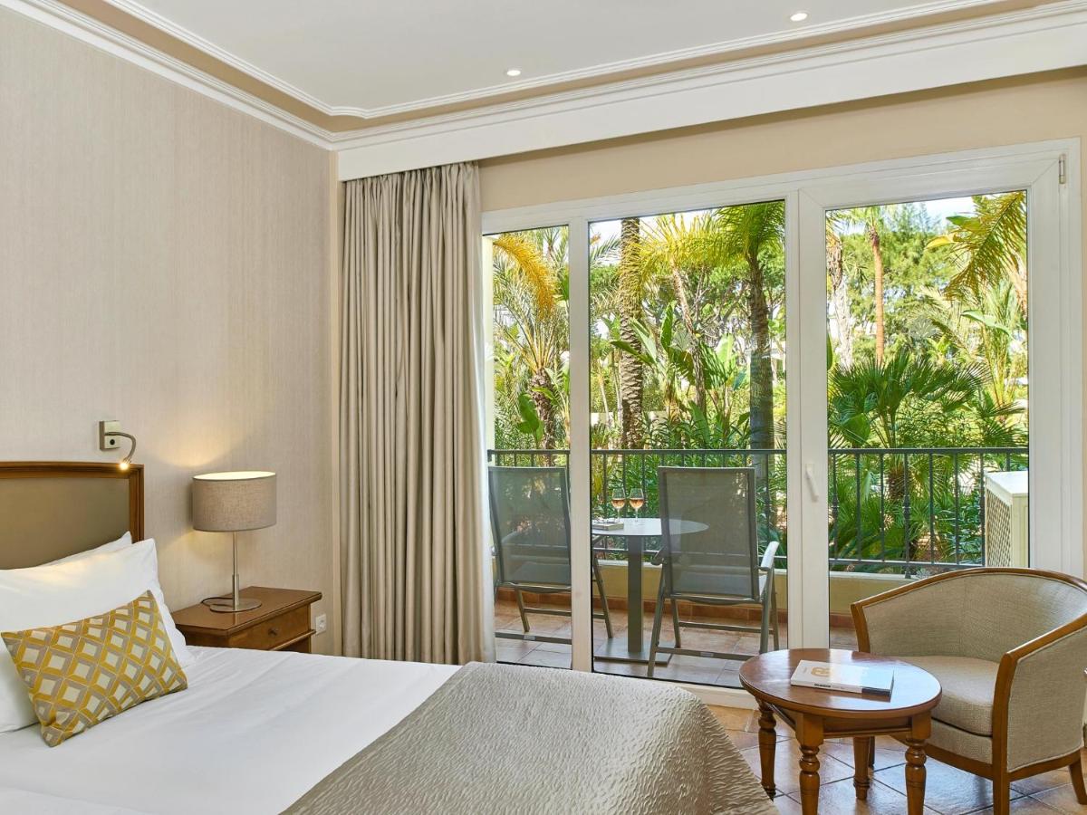 Uma cama ou camas num quarto em Ria Park Hotel & Spa