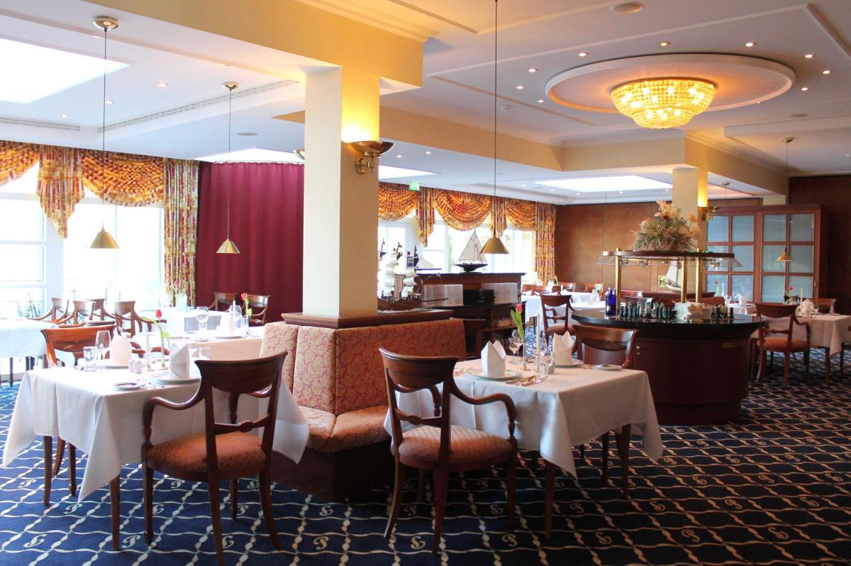 Ein Restaurant oder anderes Speiselokal in der Unterkunft Usedom Palace