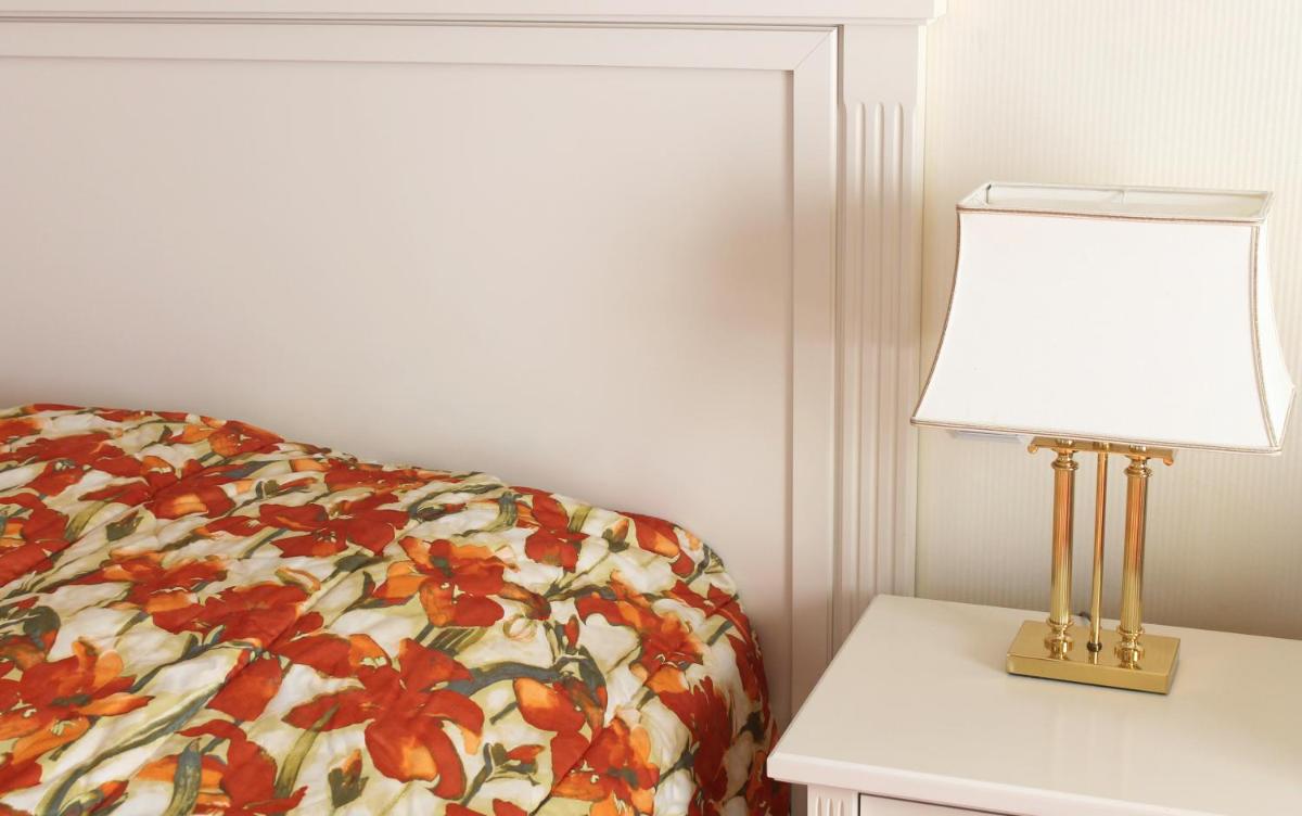 Ein Bett oder Betten in einem Zimmer der Unterkunft Usedom Palace