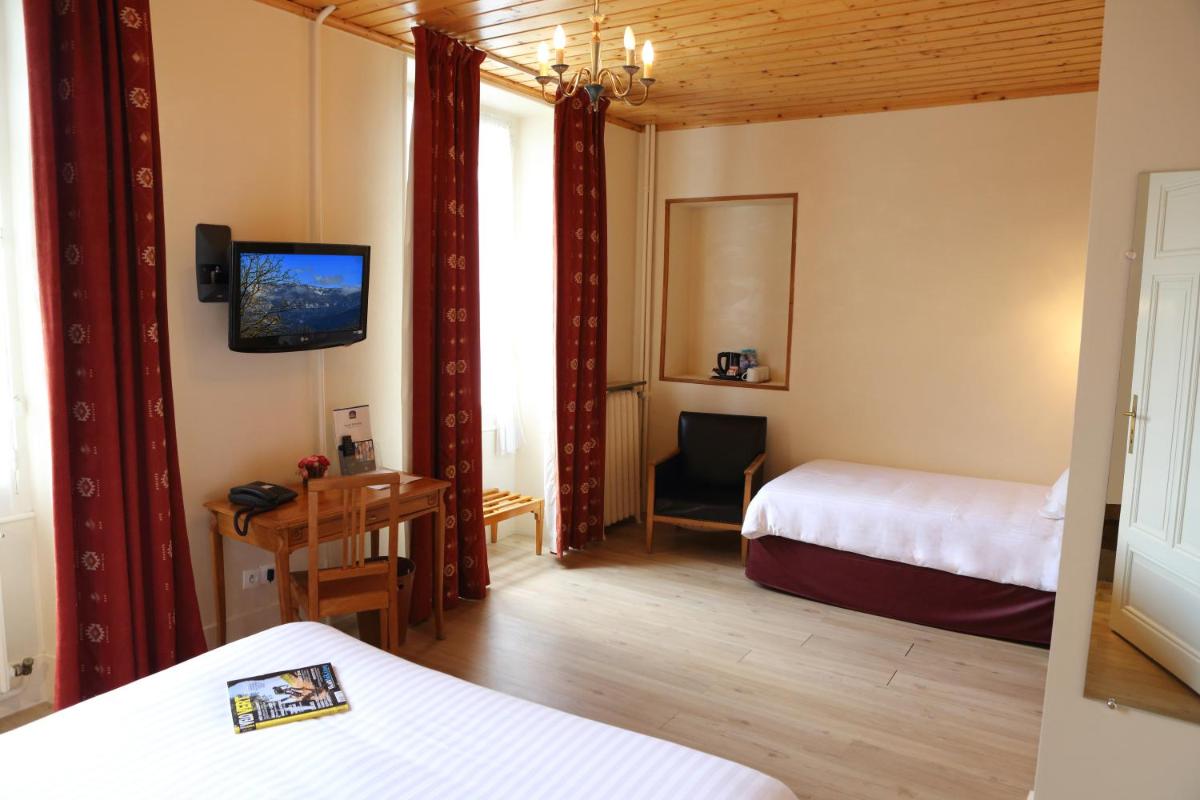 Un ou plusieurs lits dans un hébergement de l'établissement Best Western Grand Hotel de Paris & Spa