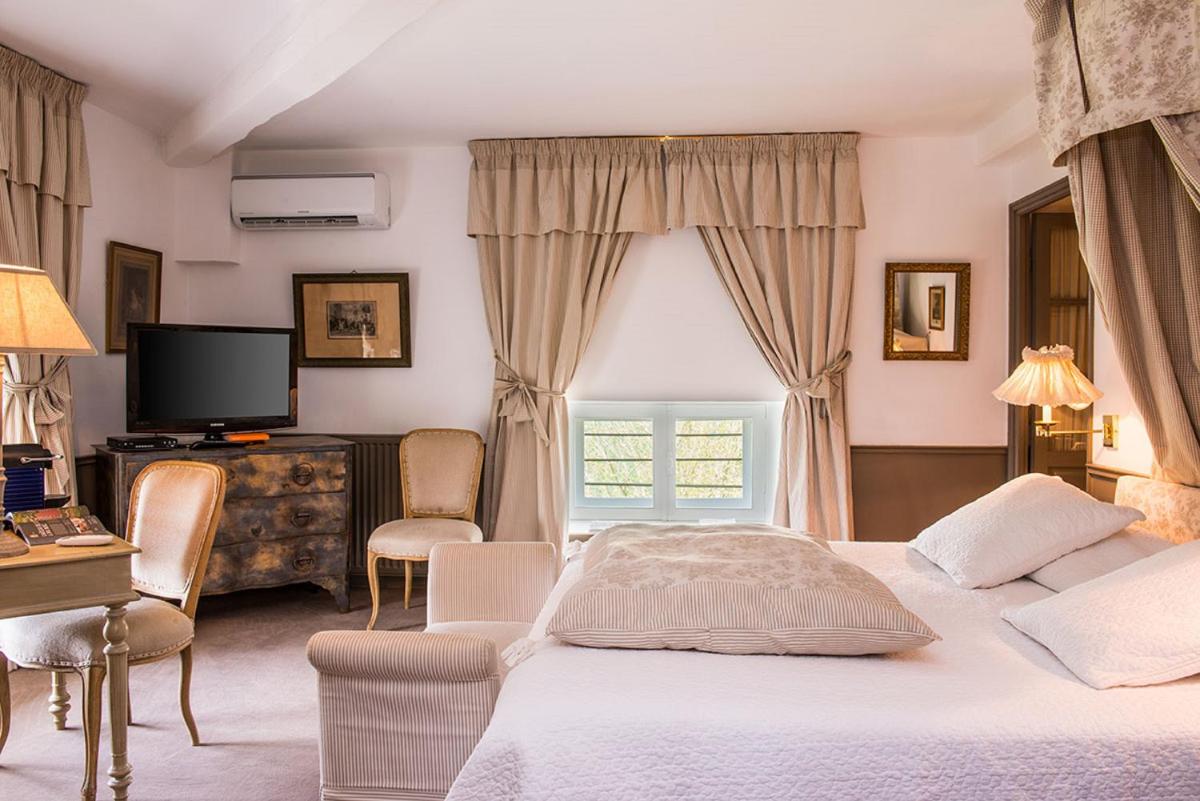 Un ou plusieurs lits dans un hébergement de l'établissement Château de Courban and Spa Nuxe