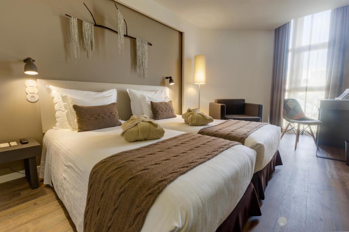 Uma cama ou camas num quarto em Puralã - Wool Valley Hotel & SPA