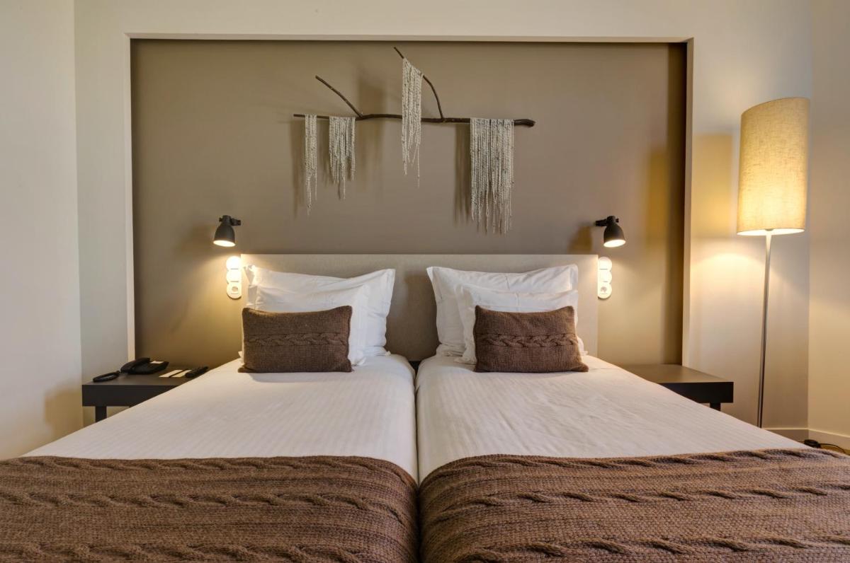 Uma cama ou camas num quarto em Puralã - Wool Valley Hotel & SPA