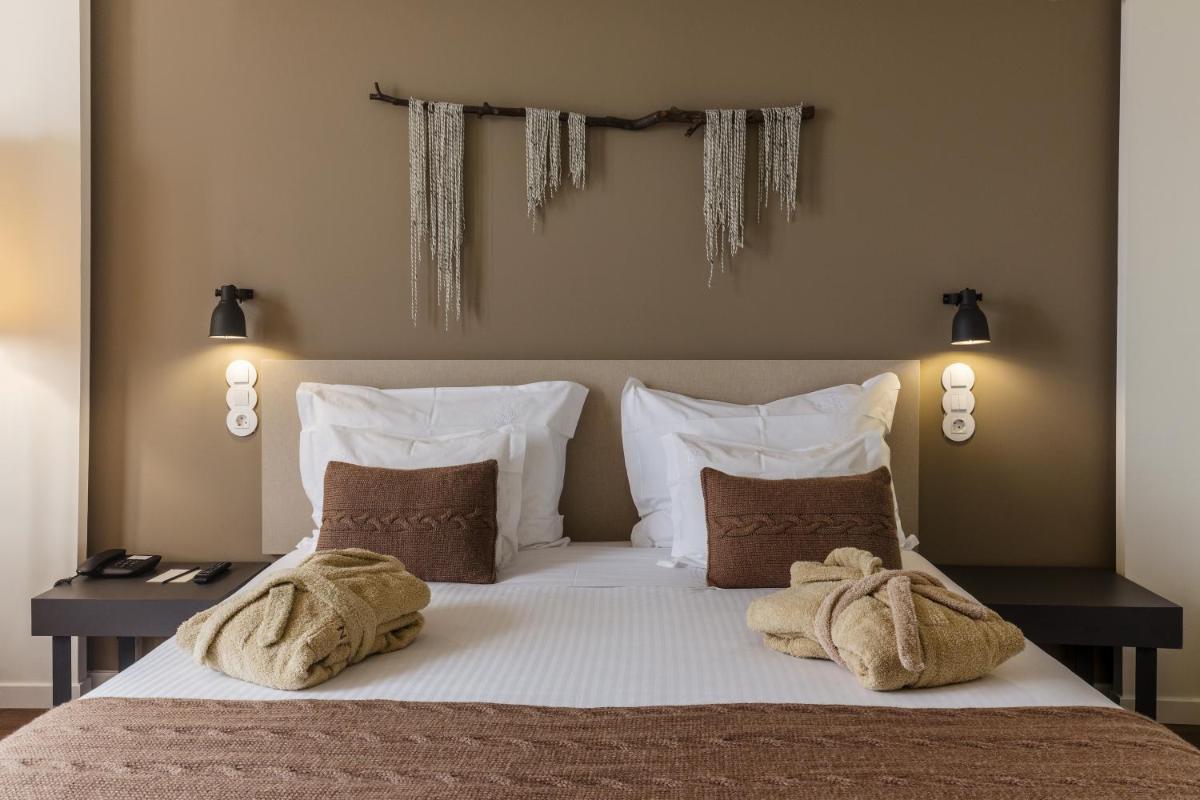 Uma cama ou camas num quarto em Puralã - Wool Valley Hotel & SPA