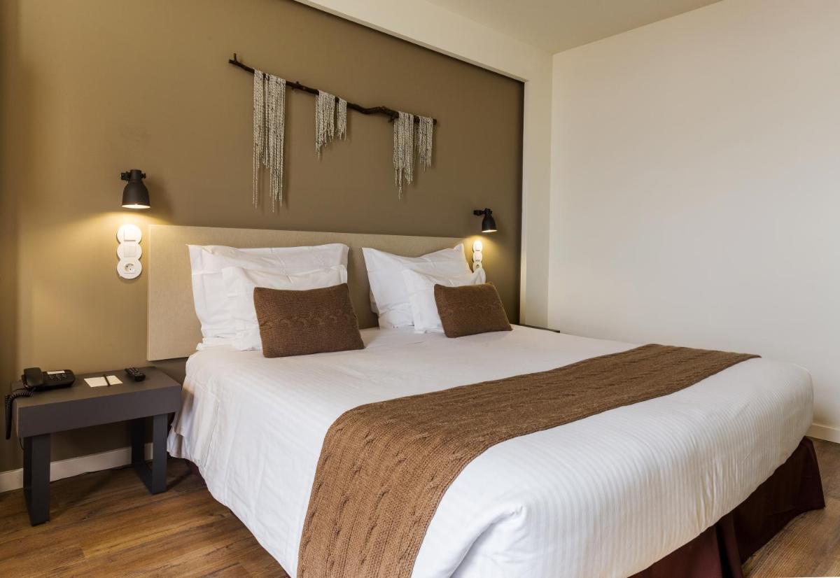 Uma cama ou camas num quarto em Puralã - Wool Valley Hotel & SPA