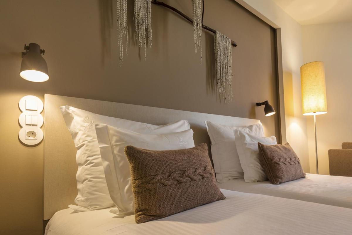 Uma cama ou camas num quarto em Puralã - Wool Valley Hotel & SPA