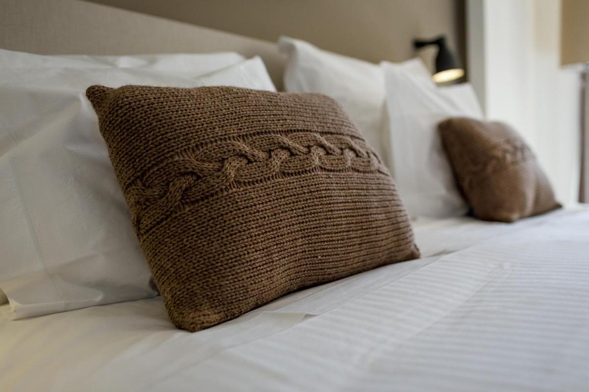 Uma cama ou camas num quarto em Puralã - Wool Valley Hotel & SPA