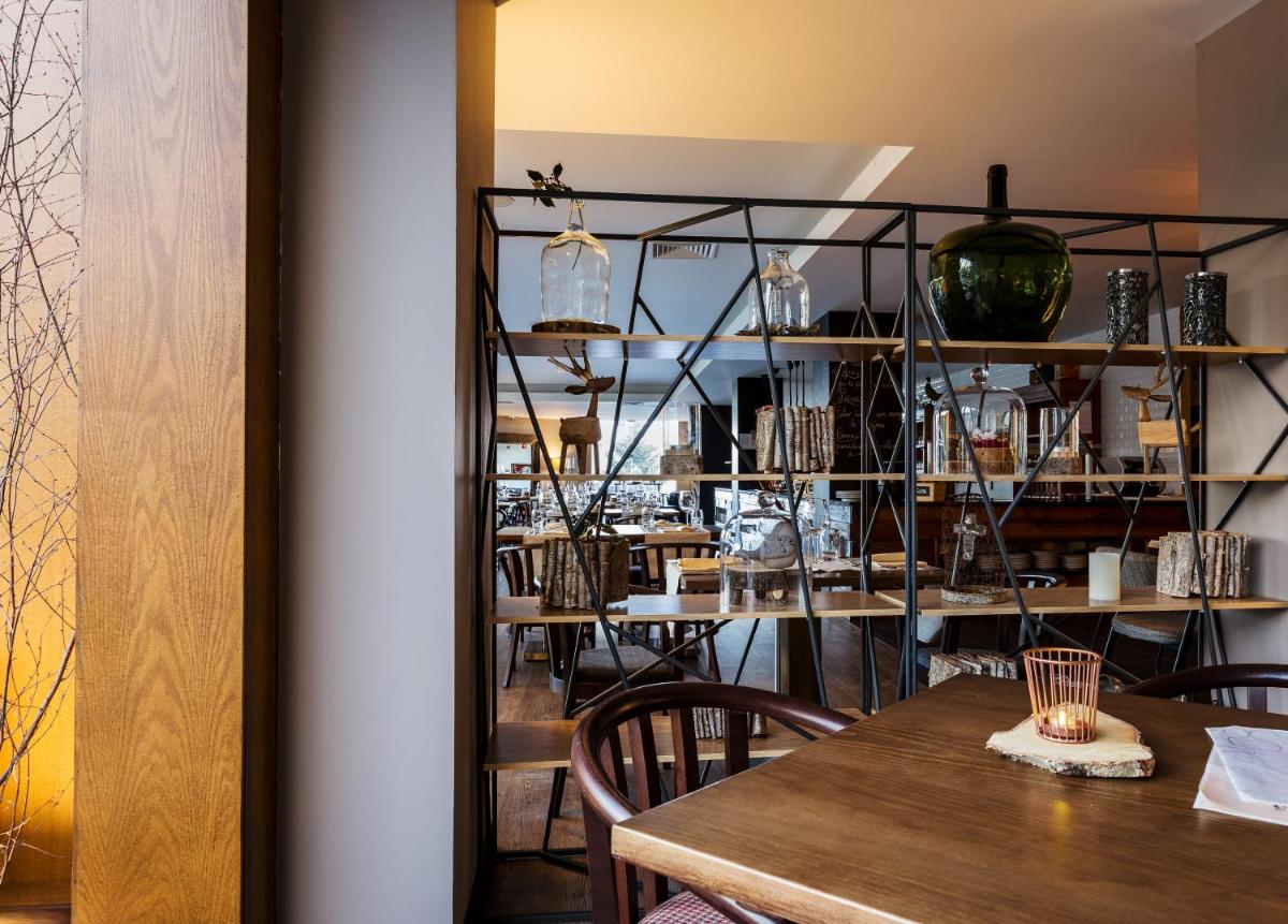 Um restaurante ou outro lugar para comer em Puralã - Wool Valley Hotel & SPA
