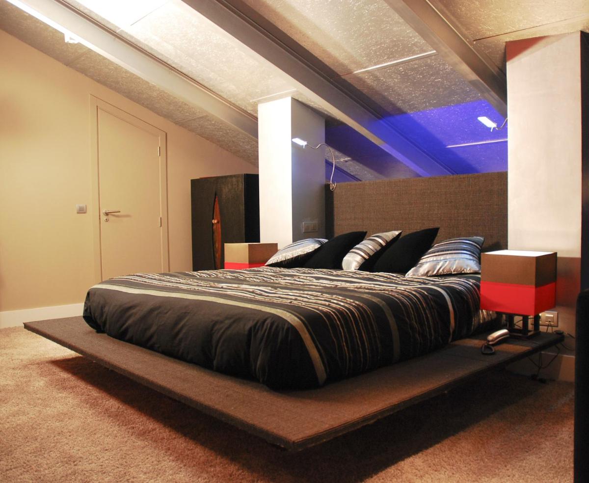 Cama o camas de una habitación en Hotel Cardamomo Sigüenza