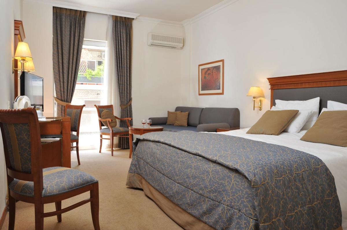 Athens Atrium Hotel & Jacuzzi Suites - Housity
