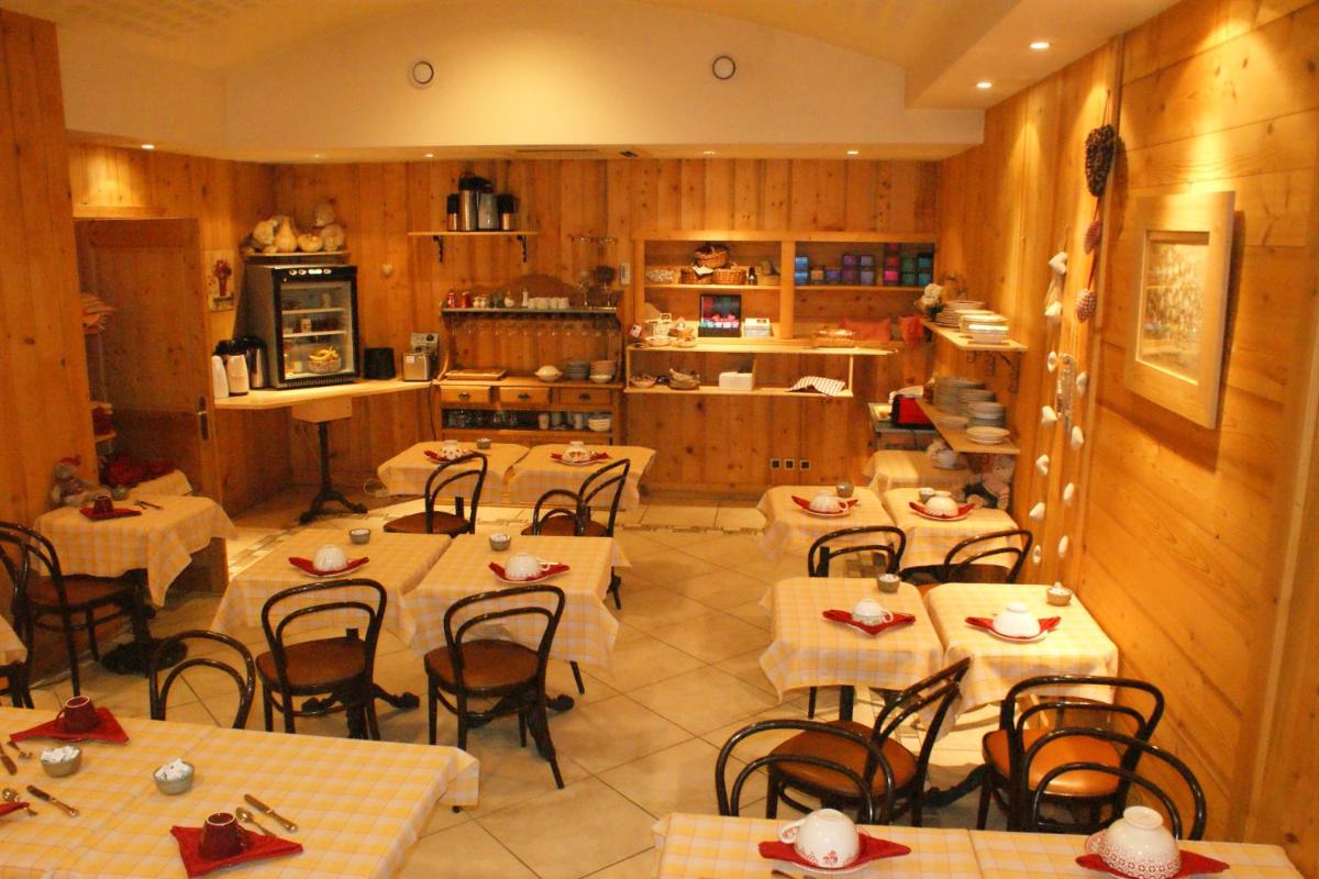 Restaurant ou autre lieu de restauration dans l'établissement Hotel Blanc