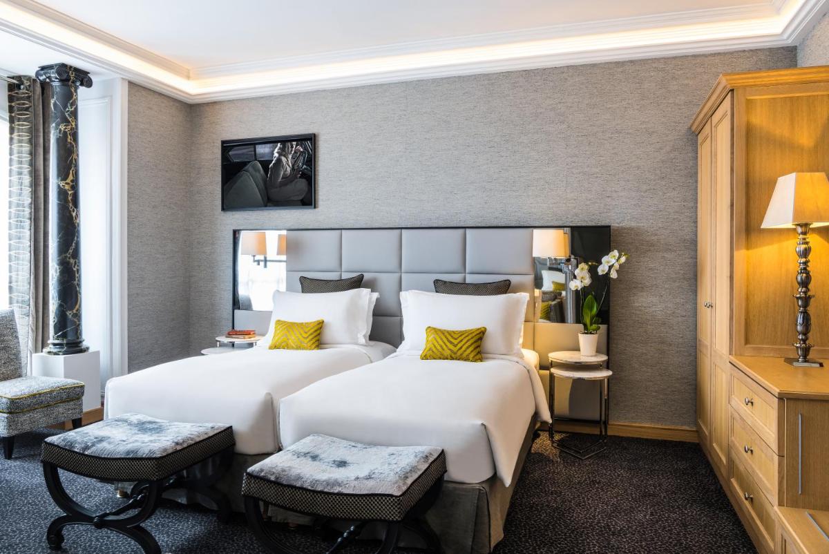 Un ou plusieurs lits dans un hébergement de l'établissement Sofitel Paris Baltimore Tour Eiffel