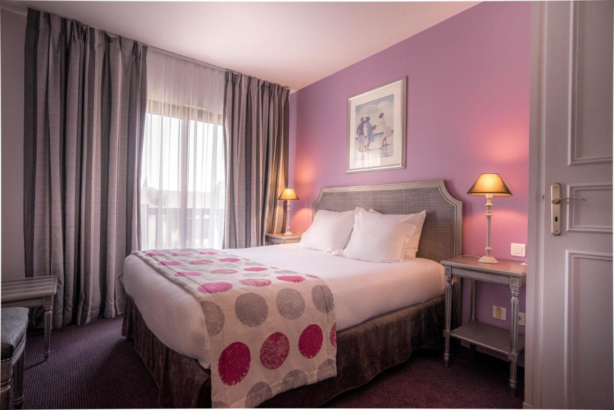 Un ou plusieurs lits dans un hébergement de l'établissement Best Western Plus Hostellerie Du Vallon