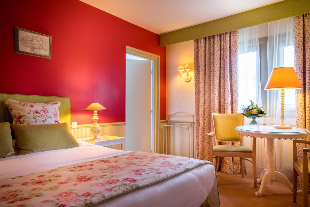 Un ou plusieurs lits dans un hébergement de l'établissement Best Western Plus Hostellerie Du Vallon
