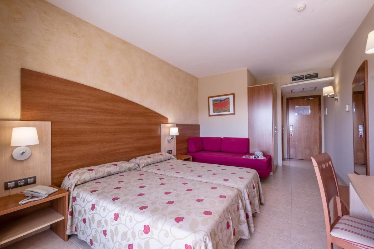 Cama o camas de una habitación en Hotel California Palace