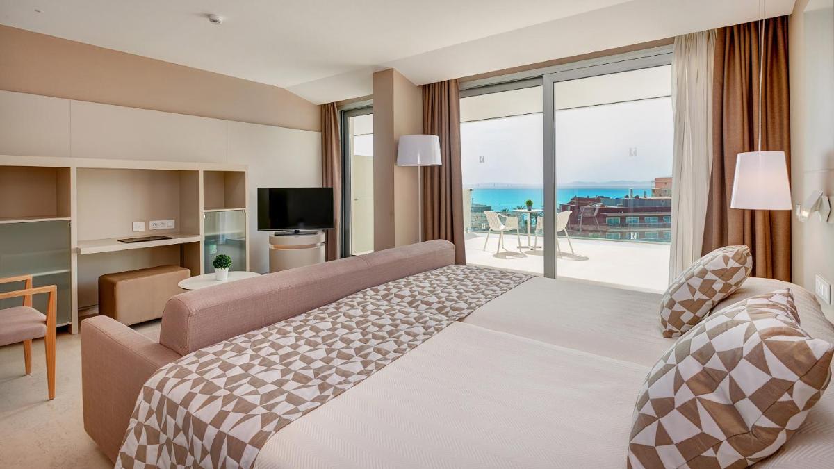 Cama o camas de una habitación en Hipotels Gran Playa de Palma