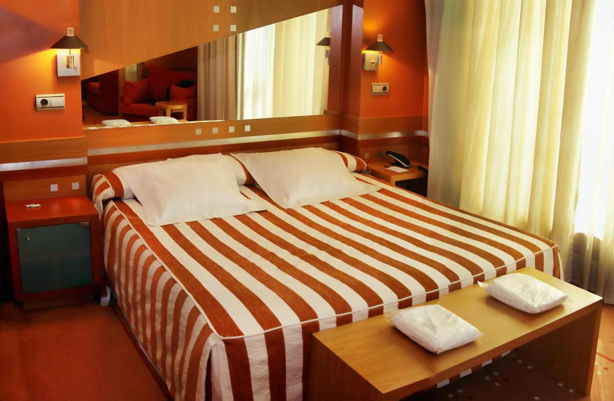 Cama o camas de una habitación en Hotel Torresport
