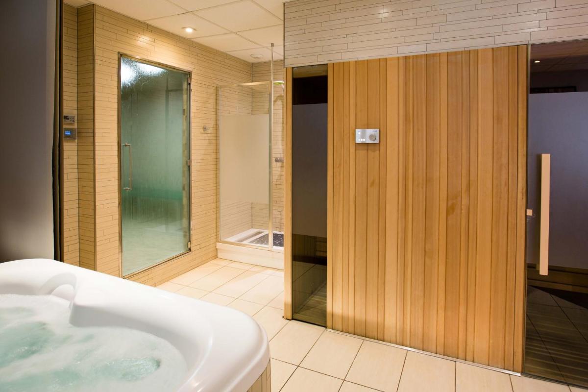 Salle de bains dans l'établissement Hôtel et Spa La Villa K - Basel Airport