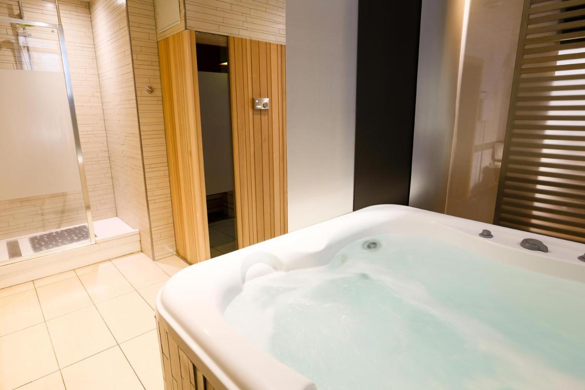 Salle de bains dans l'établissement Hôtel et Spa La Villa K - Basel Airport