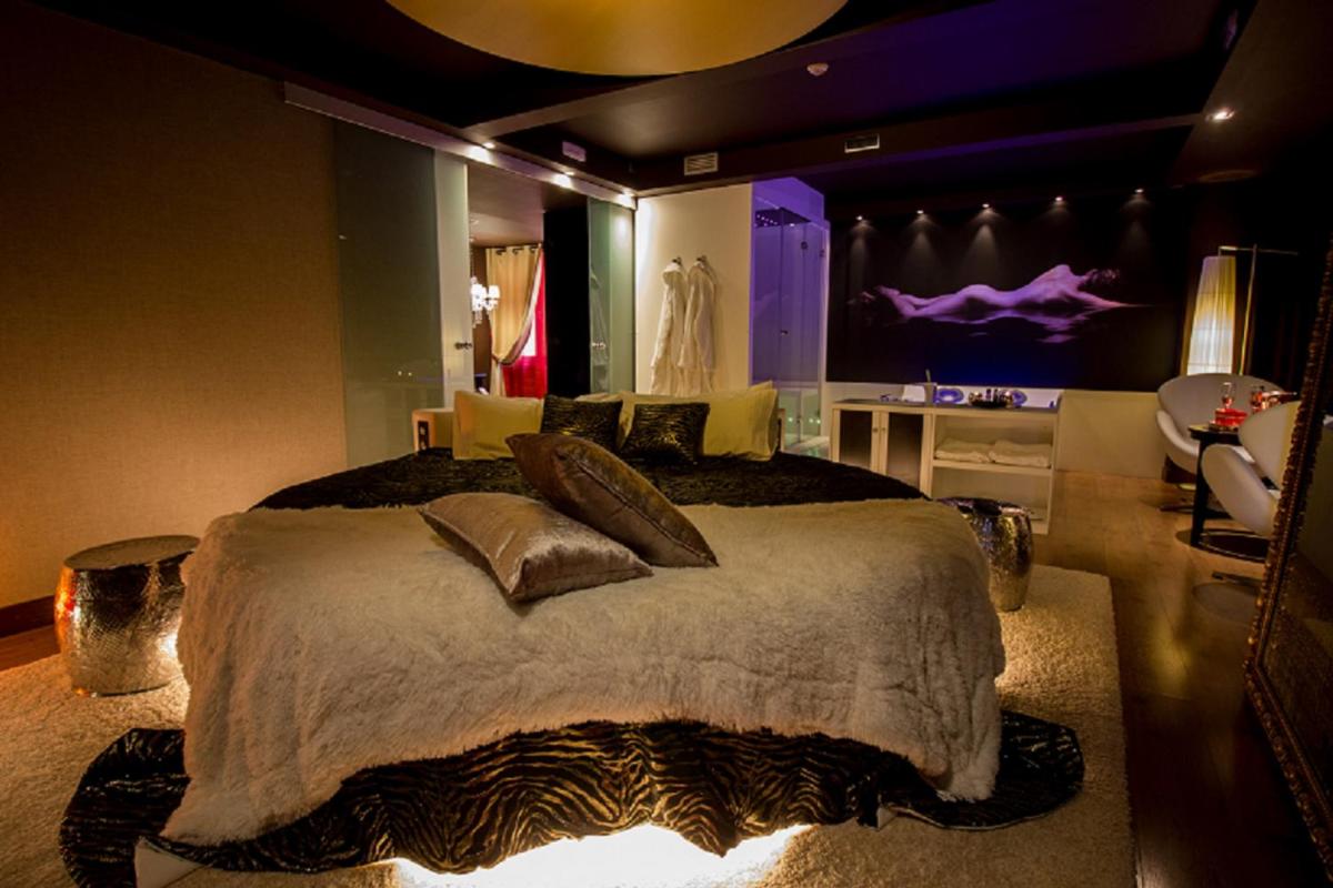 Cama o camas de una habitación en Hotel Spa Balfagon