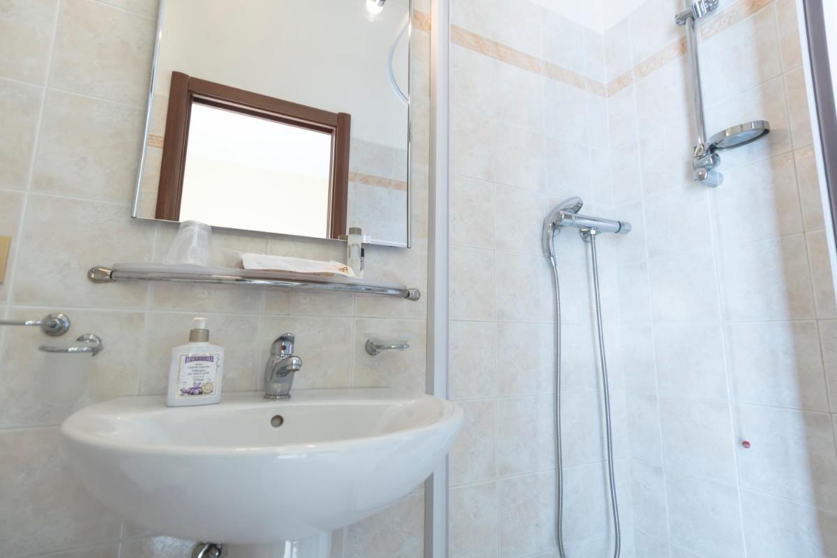 Camere Mariella - Housity