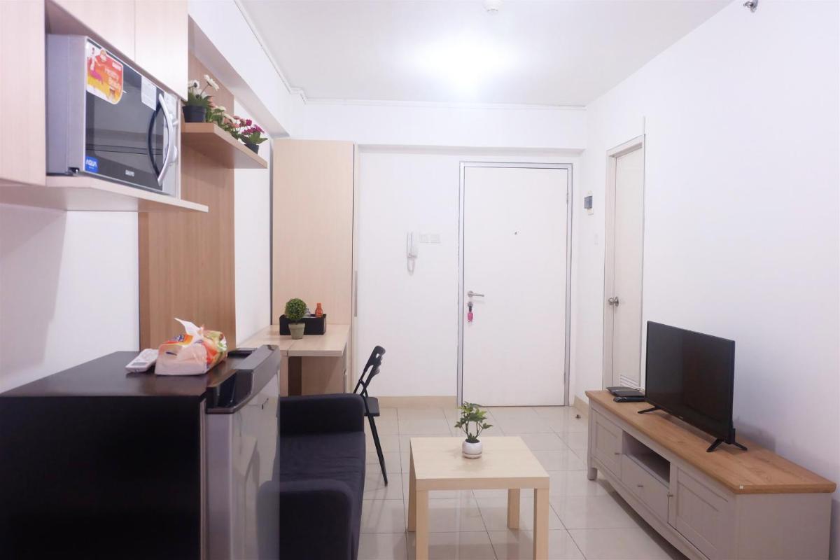2BR Cozy at Green Bay Pluit Apartment Baywalk By Travelio - Housity