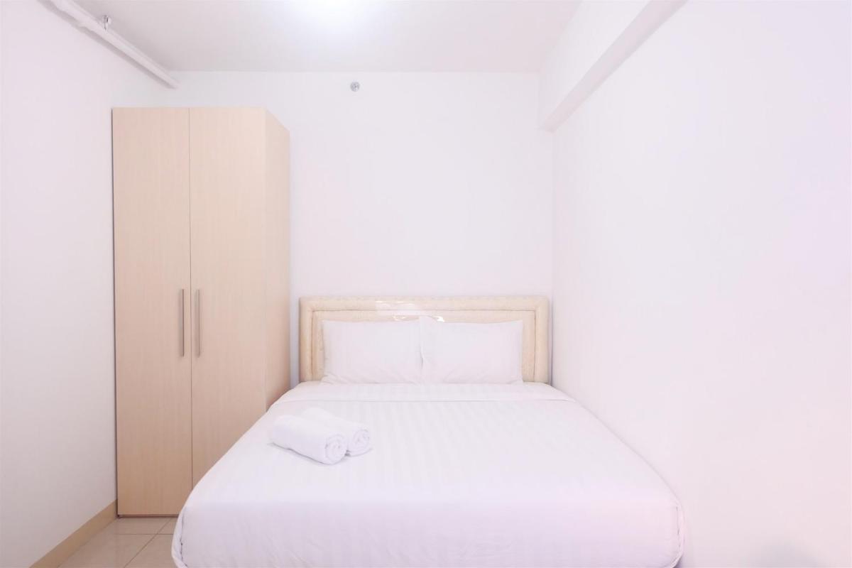 2BR Cozy at Green Bay Pluit Apartment Baywalk By Travelio - Housity