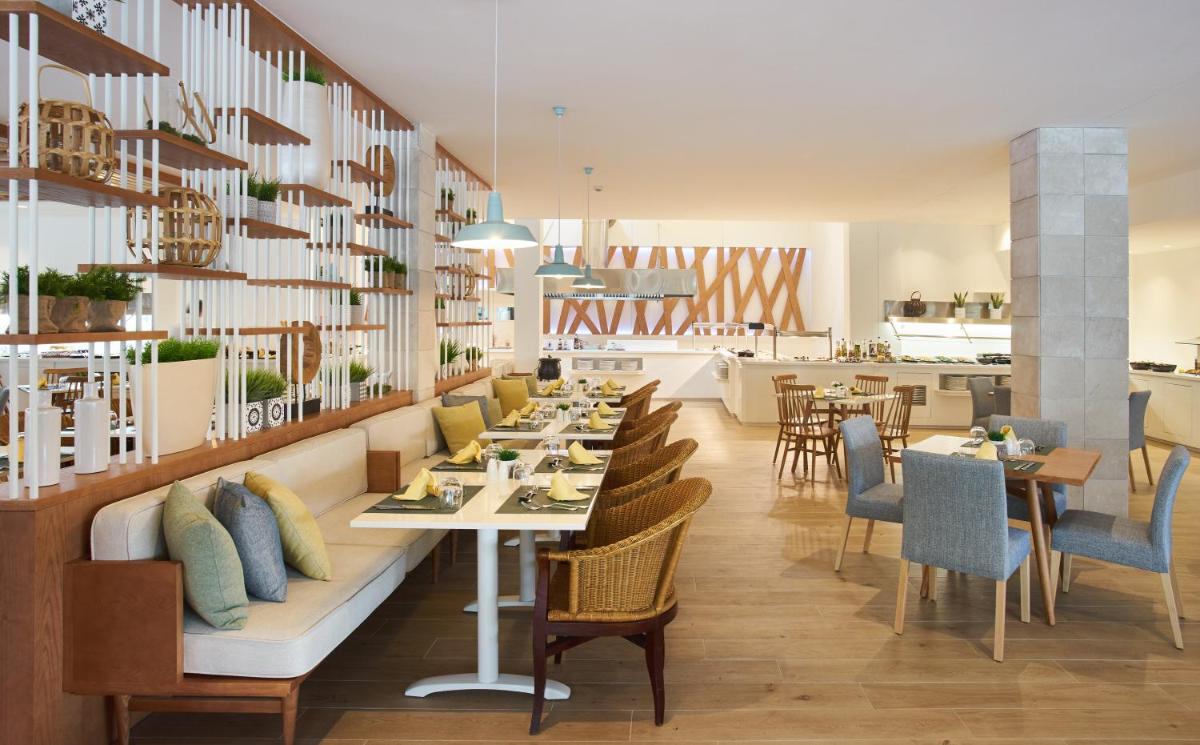 Un restaurante o sitio para comer en Club del Sol Aparthotel