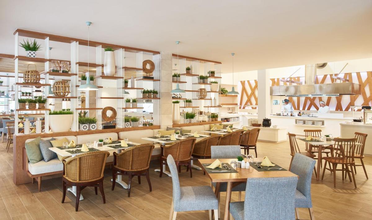 Un restaurante o sitio para comer en Club del Sol Aparthotel