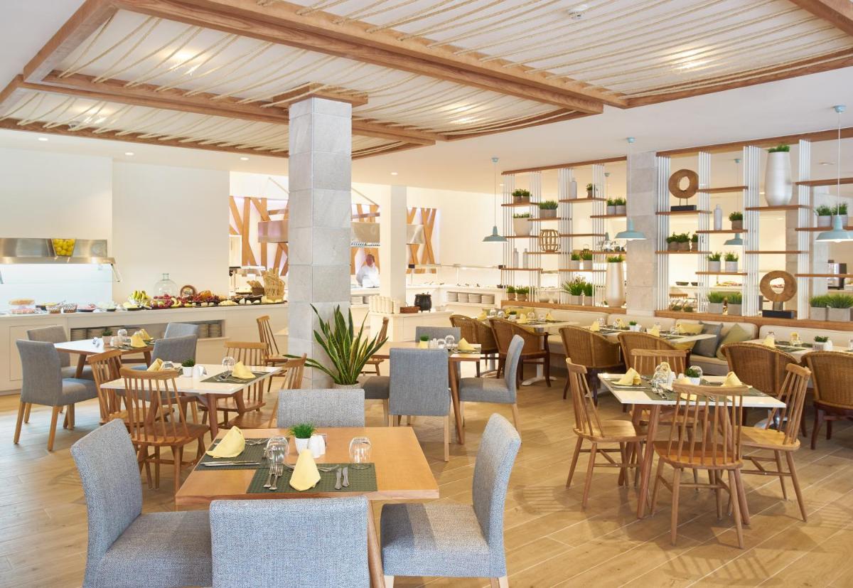 Un restaurante o sitio para comer en Club del Sol Aparthotel