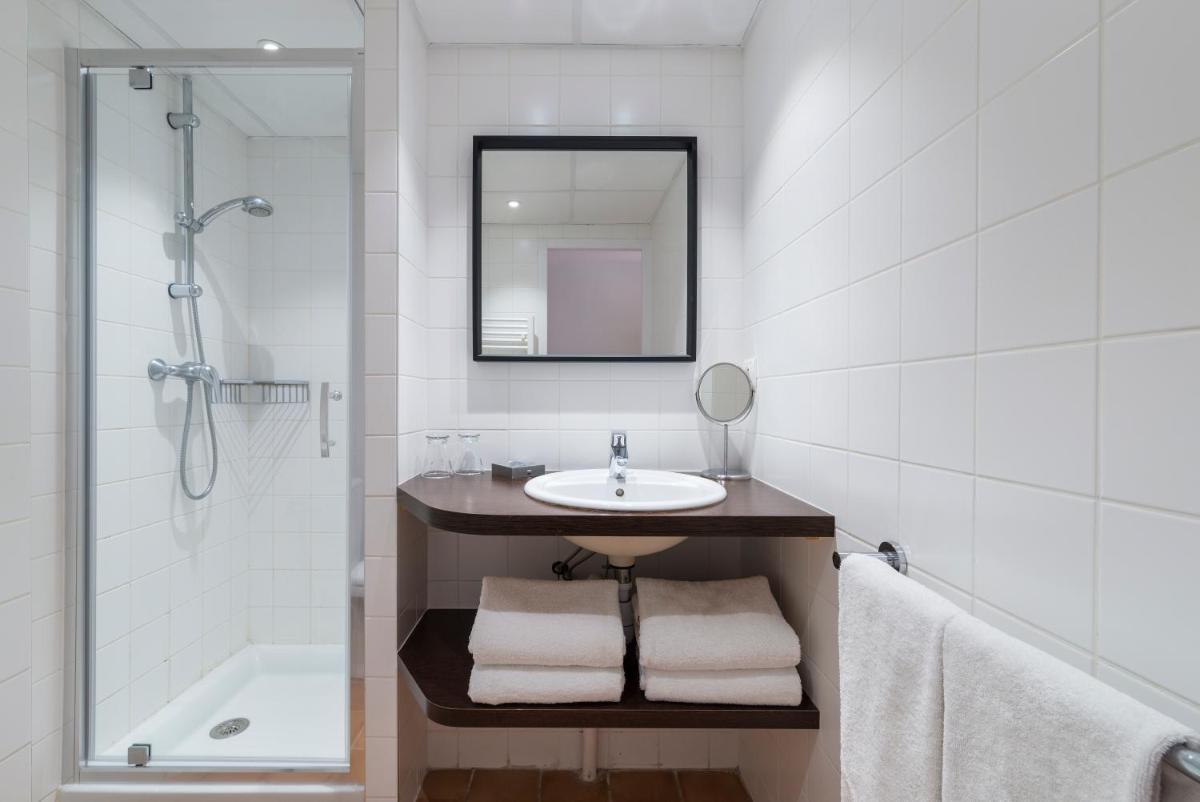 Salle de bains dans l'établissement La Résidence du Bailli